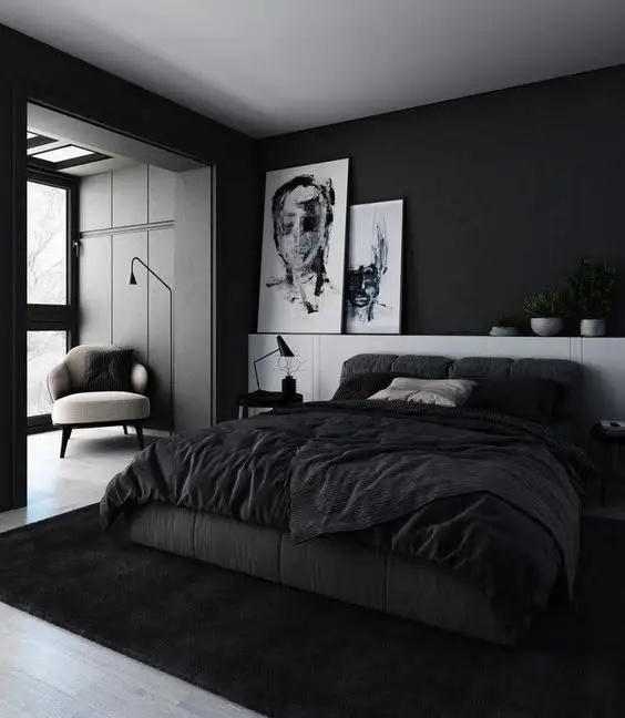 Bedroom design featuring dark accent walls, modern furnishings, and ambient lighting, creating a cozy and stylish atmosphere.