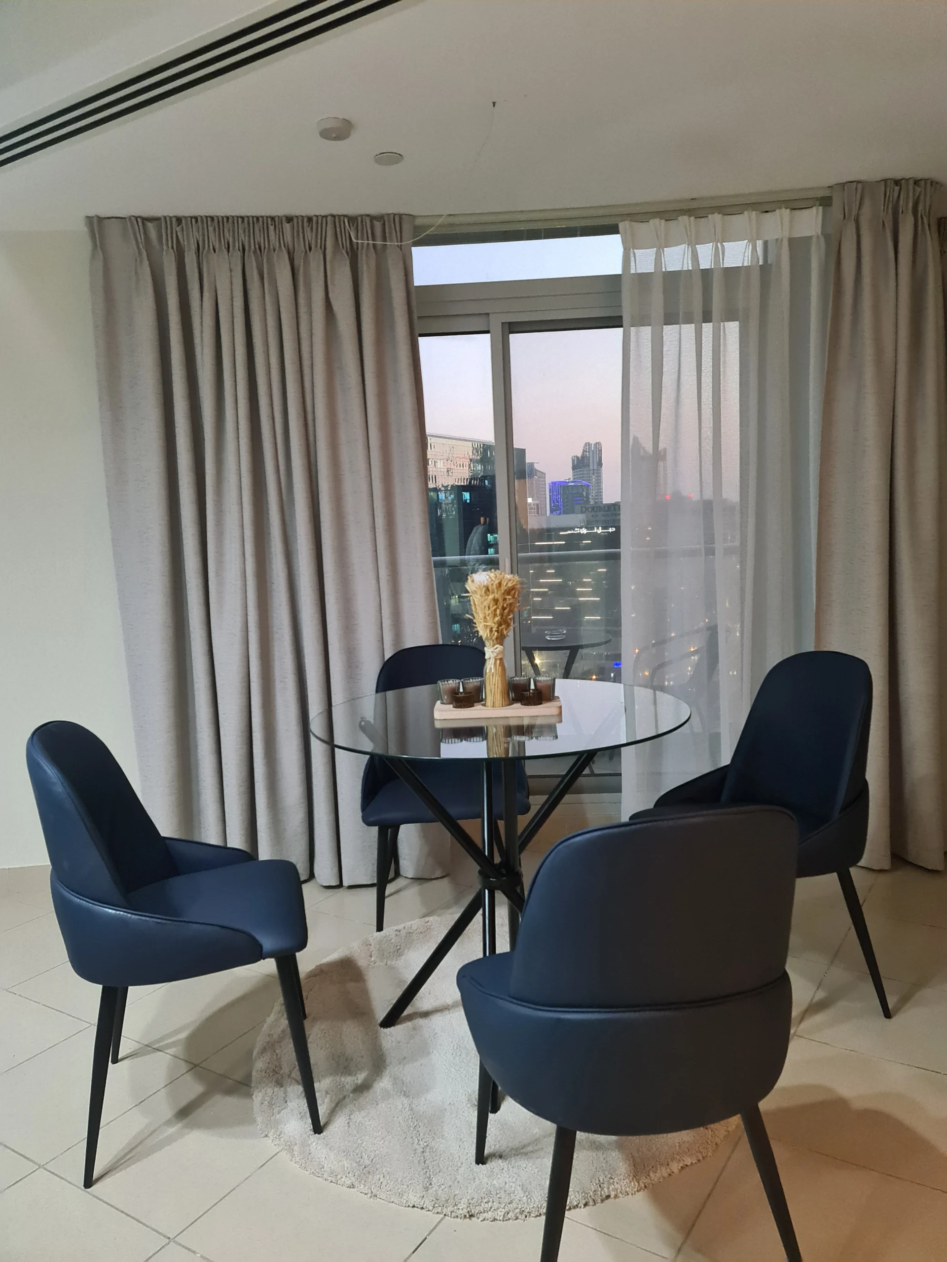 Dining room interior designer in Burj Views Dubai, creating modern and elegant layouts for refined living.