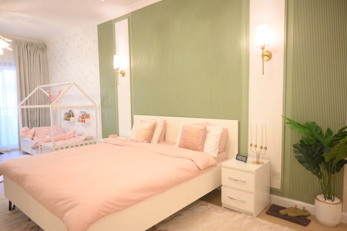 Contemporary kids' bedroom interior design with playful colors and modern furniture in Dubai, UAE.