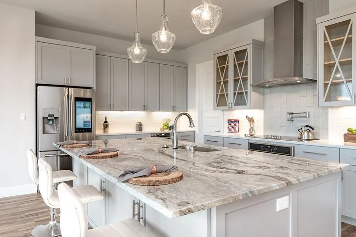 Modern kitchen with sleek countertops and minimalist decor.