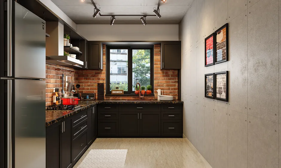 L-shaped industrial-style kitchen with a blend of modern and rustic elements, featuring dark cabinetry, exposed brick backsplash, stainless steel appliances, and track lighting.