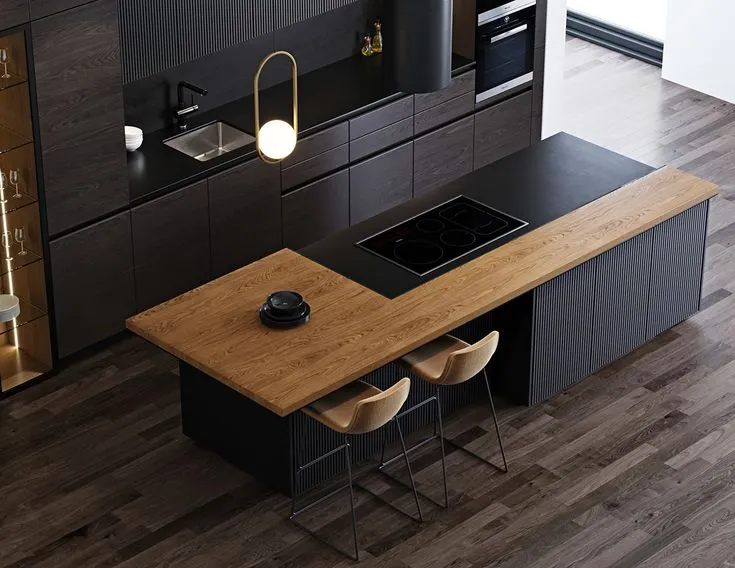 Modern open kitchen with white cabinets, marble island, and pendant light