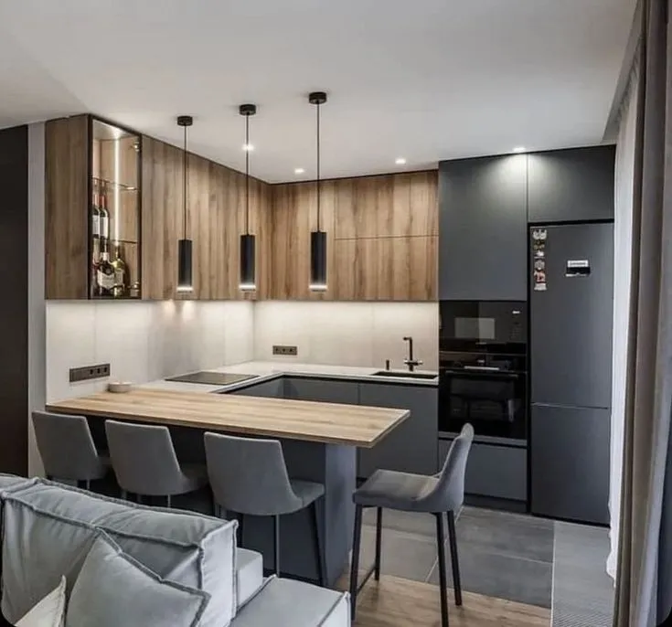  U-shaped kitchen with a blend of wooden and matte black cabinets