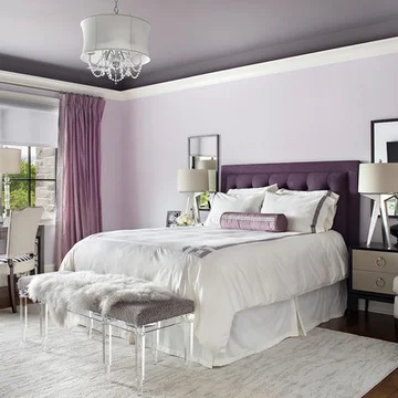 Elegant purple-themed bedroom with a sophisticated bedroom wall color combination.