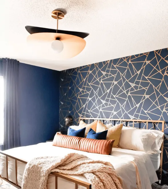 Blue bedroom, gold pattern wall, modern light, metal bed