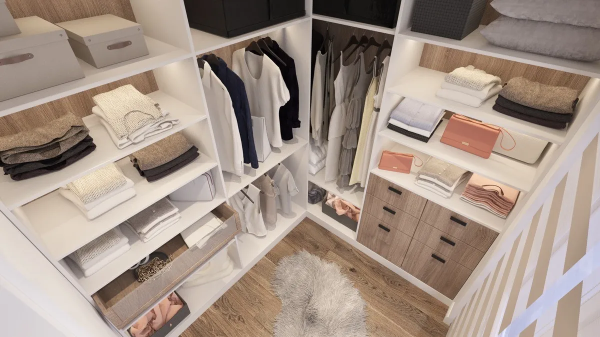 Attic walk-in wardrobe with angled shelves, maximizing storage in a sloped space.