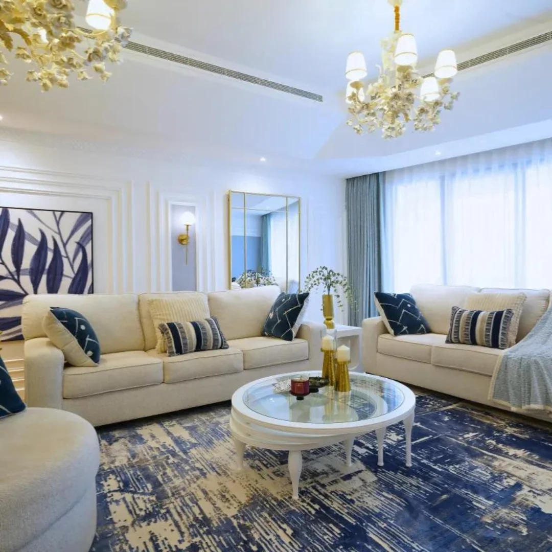 Elegant living room with blue and white tones soft lighting and decor