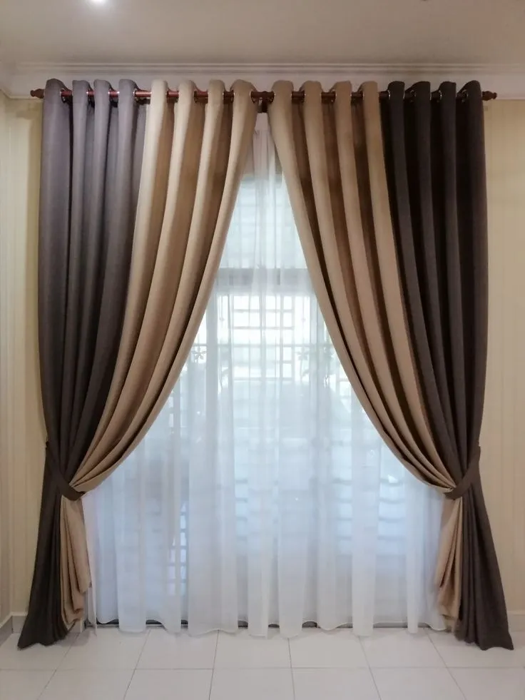 Elegant living room design for small space layered window curtains.