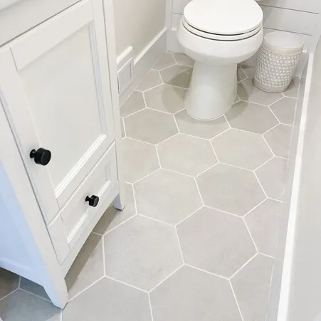 Hexagon tile bath white cabinet toilet simple clean