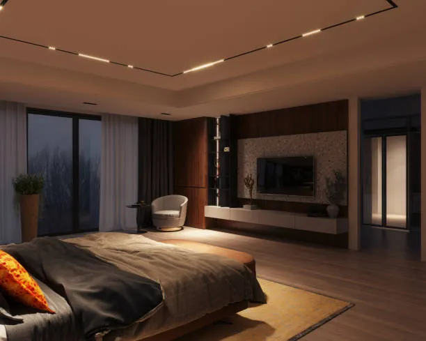 Modern luxury bedroom with a sleek bedroom wall color combination in dark tones & warm lighting