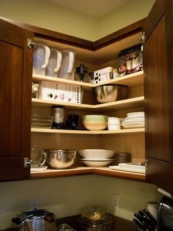 Luxury Indian kitchen with marble countertops and wooden cabinetry