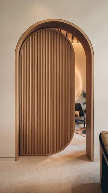 Arched ribbed door, wood, modern design, open view.