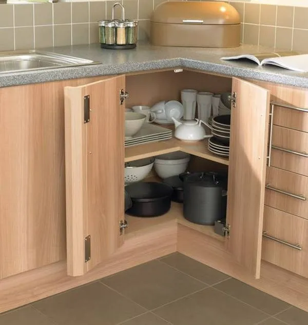 Corner kitchen cabinet with organized storage for cookware and dishes