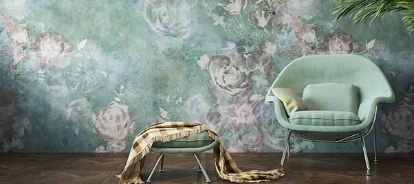 Floral wall art with soft hues and vintage-style seating