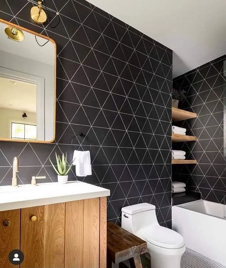 Geometric tile bath dark walls wood vanity gold accents