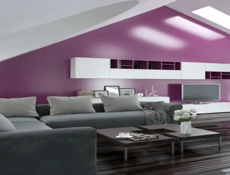 Modern living room with purple wall painting design and gray sofa.