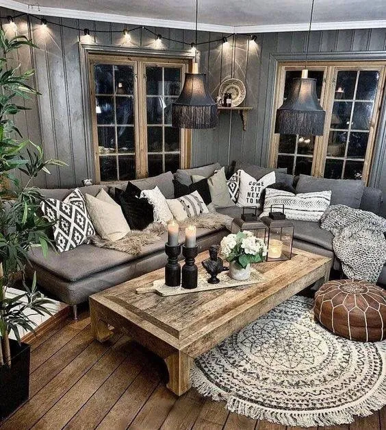 Rustic gray living room with warm lighting and wooden accents