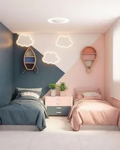 Shared kids room with pink and blue walls themed decor and divided design