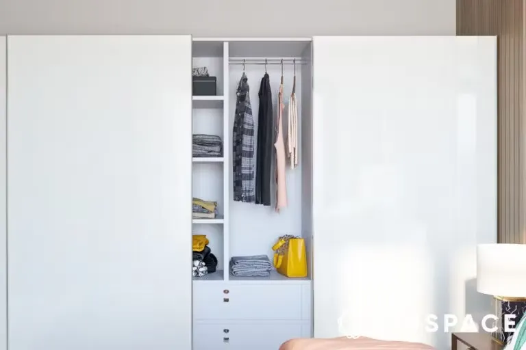  Modern white wardrobe with sliding doors and open shelves