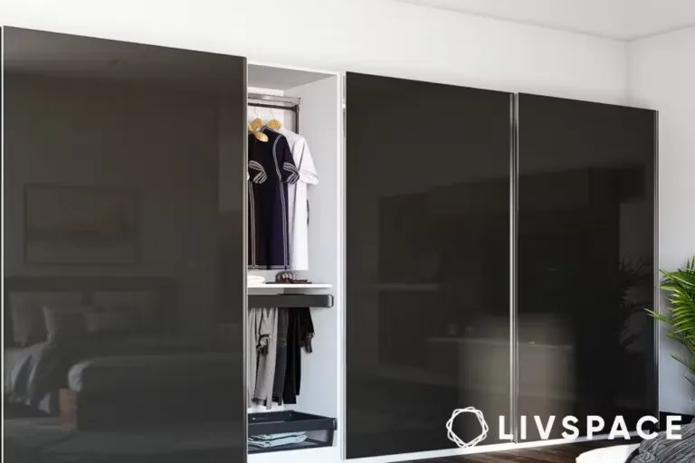 Modern wardrobe with dark sliding doors