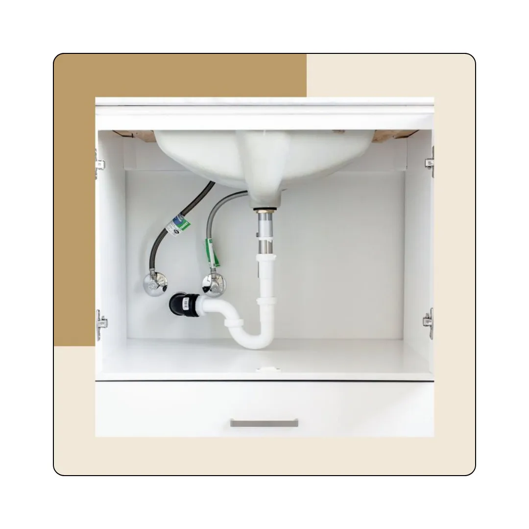 Kitchen sink plumbing, cabinet interior, pipe layout guide.