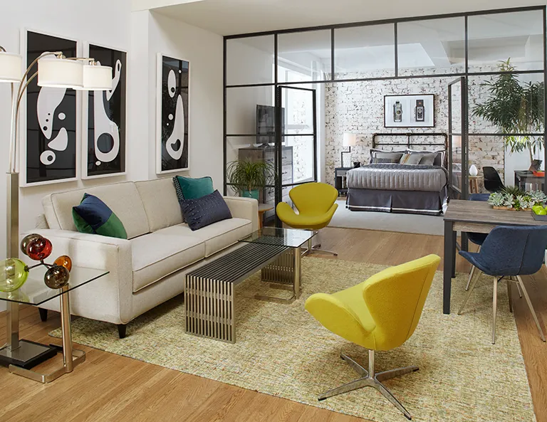 Modern studio apartment with glass partition and bright decor