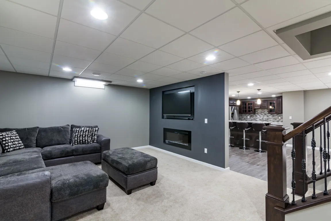 Modern Basement with Gray Sectional Sofa BASEMENT PAINT COLOR