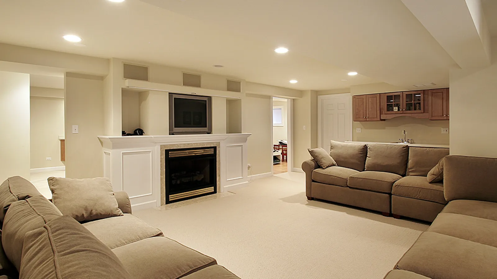 Warm Brown Sofas in traditional BASEMENT PAINT COLOR room