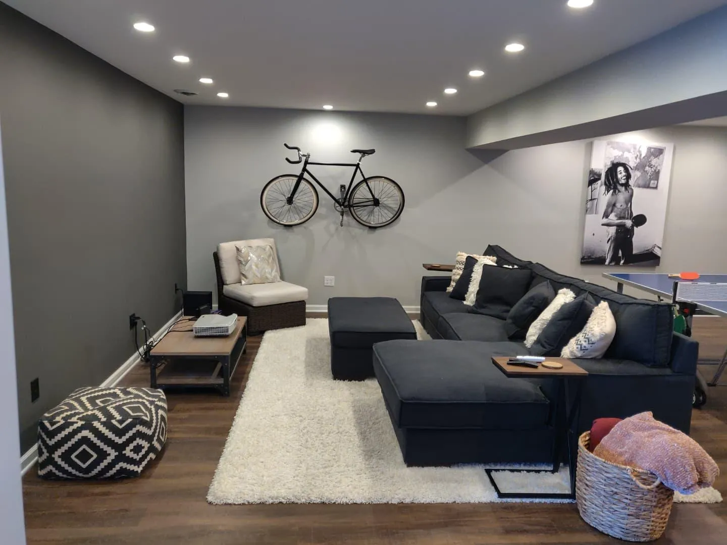  Gray basement with bicycle on wall BASEMENT PAINT COLOR