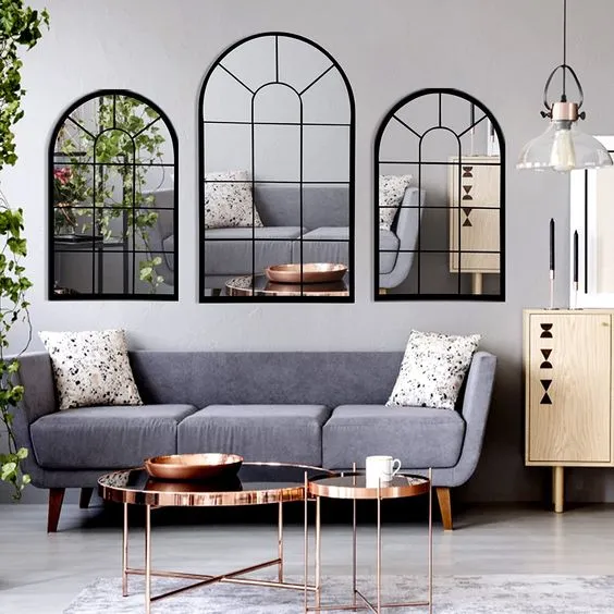  Small living room gray sofa metal mirrors wood cabinet