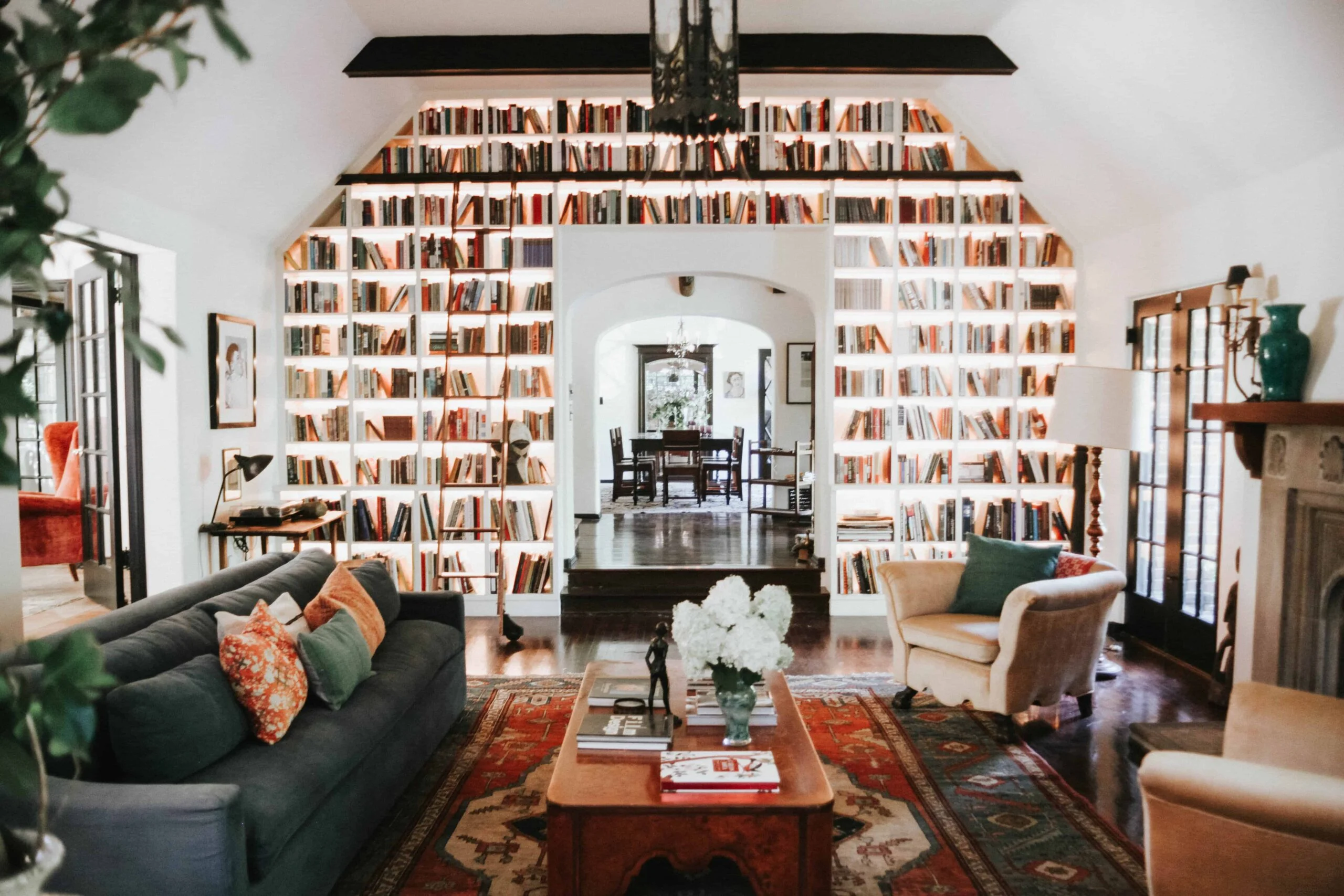 Small living room with books gray sofa wood table